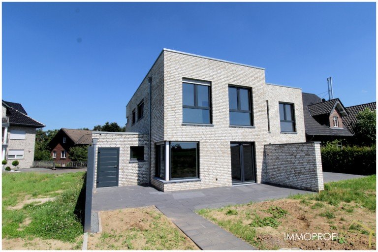 Geb�udeansicht R�ckseite 1 2 Waldfeucht Doppelhaush�lfte Waldfeucht-Haaren: Moderne Doppelhaush�lfte mit Garage